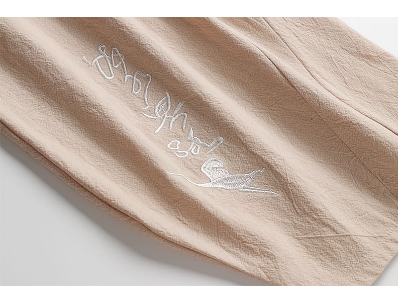 メンズのチャイナボタンセットアップ