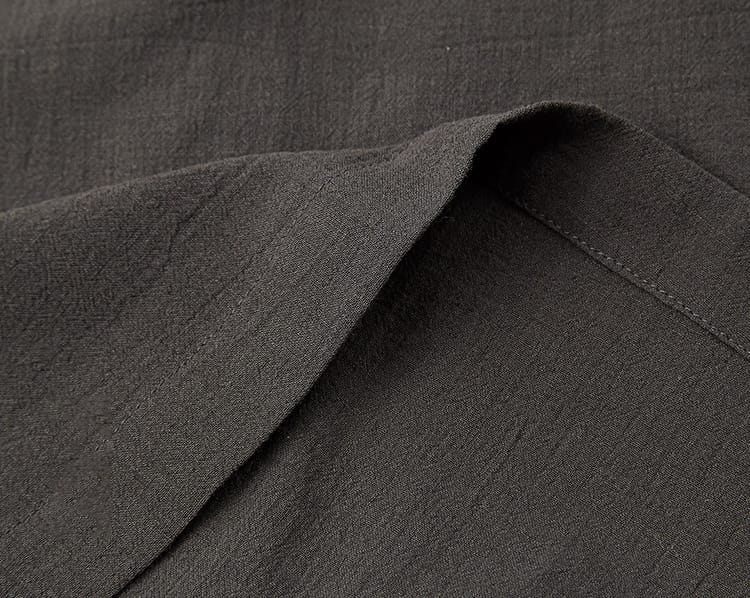 男性用のチャイナボタンのスーツ