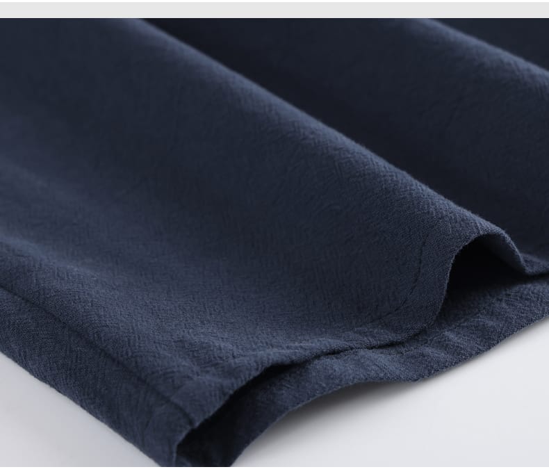 男性用のチャイナボタンのシャツ