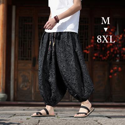 立体的な花柄ジャカード生地の黒のバルーンハーレムパンツ